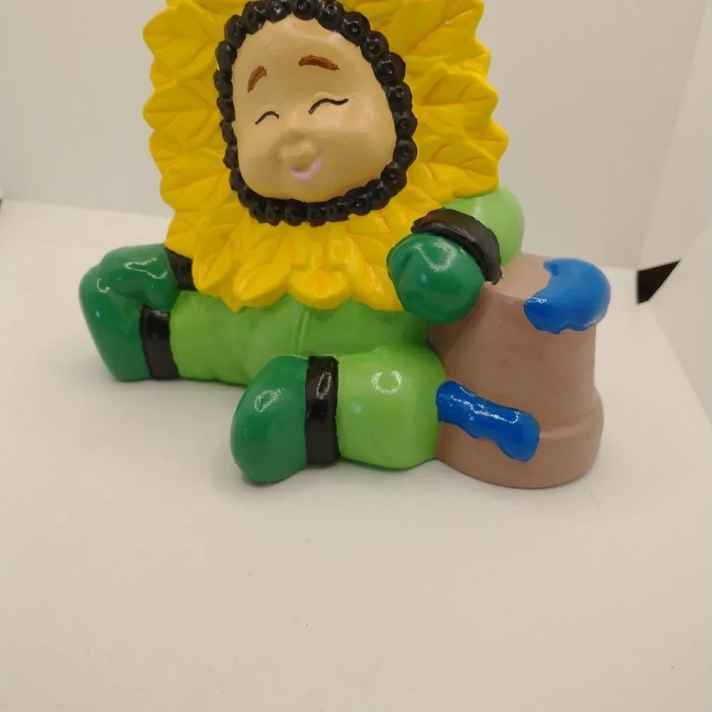Hand Crafted Sun Flower Baby Figurine with a flower pot Painted Vintage Ceramic